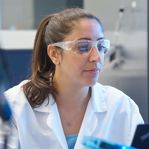 Woman scientists wearing safety glasses